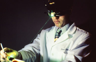 Eye Doctor Performing Retinal Laser Surgery